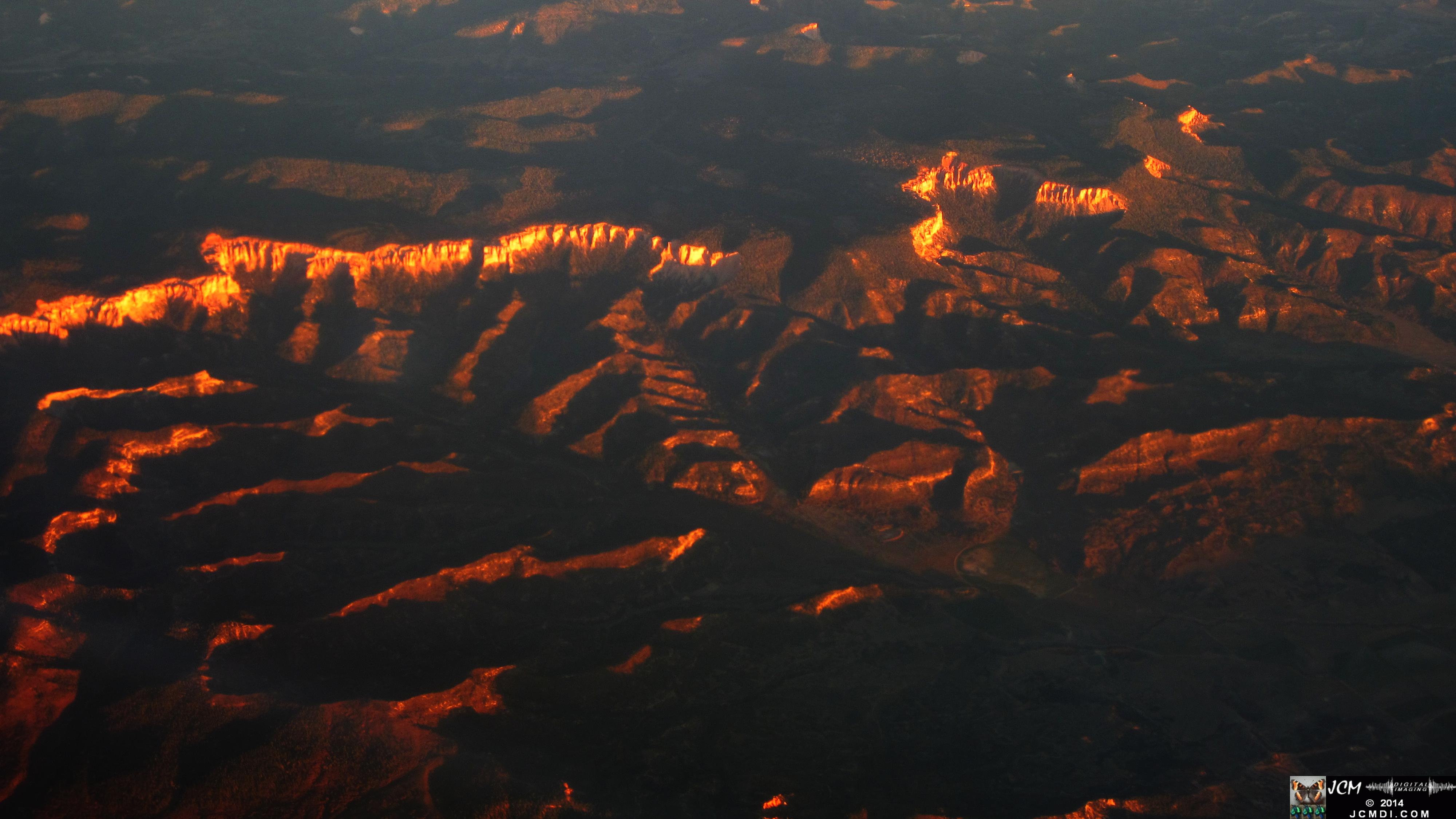 MSP-LAX canyon terrain sunset ridges from airline window